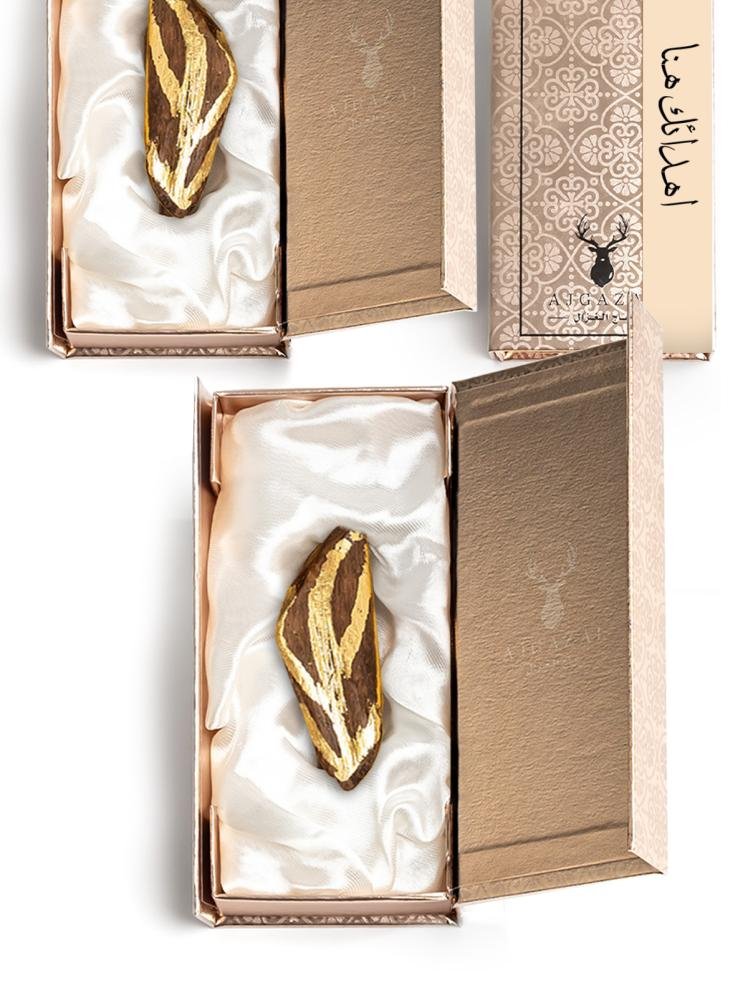 7d6998a4-729b-45fc-9186-bc771662cdae-748.59638178415x1000-y0ejROfjJtBVGYAyjrkbB4ObhkQyASyOASRQCUWW توزيعات عود بنقش ذهب - الصورة 1